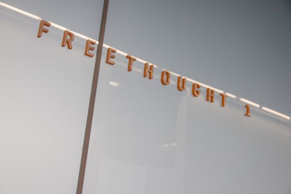 Offering stunning views of the atrium below, the Freethought 1 and 2 conference rooms provide much needed meeting space for the CIS community. Photo of the Freethought 1 conference room